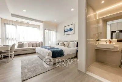 Luxurious modern bedroom with ensuite bathroom and natural light
