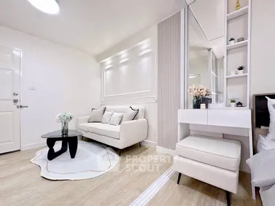 Modern living room with elegant decor and cozy seating area