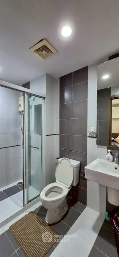 Modern bathroom with sleek shower and contemporary fixtures
