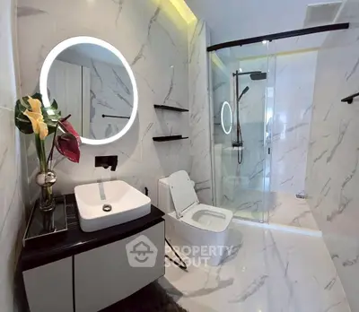 Luxurious modern bathroom with elegant marble tiles and sleek fixtures