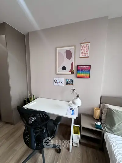 Modern study area with stylish desk and chair, perfect for productivity.