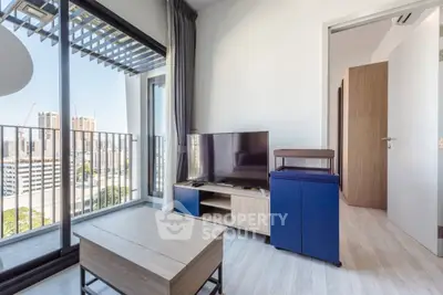 Modern living room with balcony view in high-rise apartment