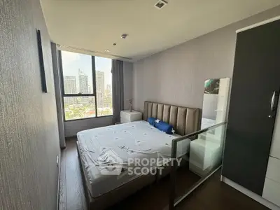 Modern bedroom with city view and stylish decor