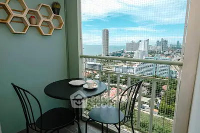 Charming balcony with stunning city and ocean view, perfect for relaxation and enjoying the skyline.