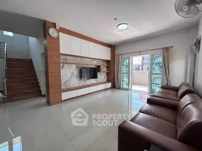 Spacious modern living room with sleek design and natural light