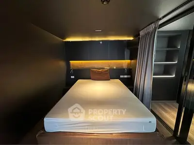 Modern bedroom with sleek design and ambient lighting