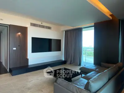 Luxurious modern living room with sleek design and stunning balcony view