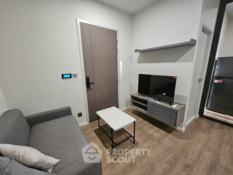 Modern living room with sleek furniture and smart home features