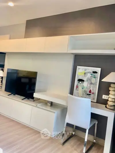 Modern living room with sleek TV unit and stylish decor