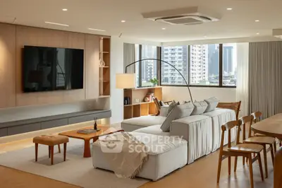 Spacious modern living room with large sectional sofa and city view, perfect for relaxation and entertainment.