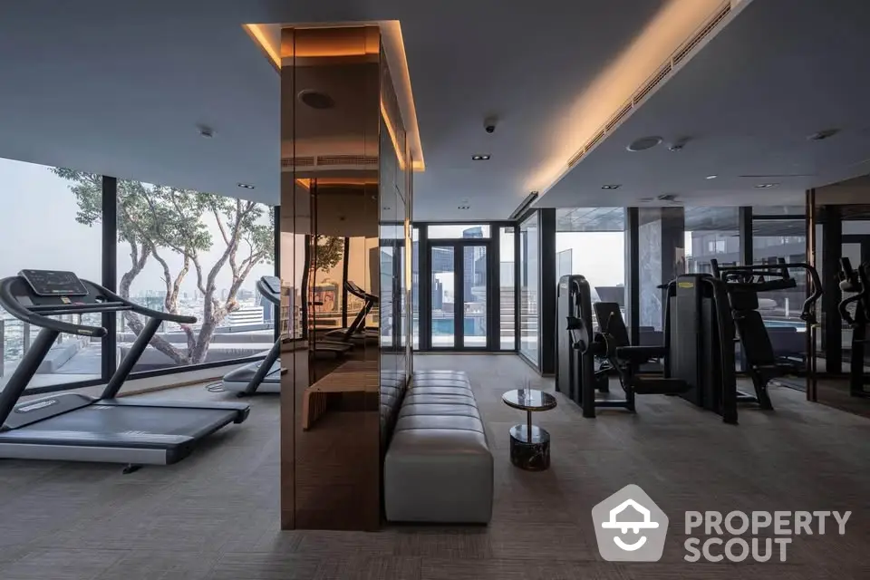 Luxurious modern gym with city view and state-of-the-art equipment