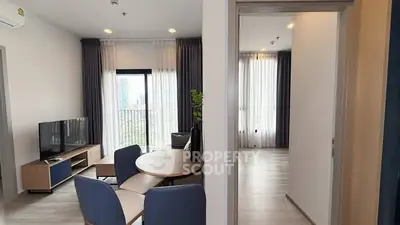 Modern apartment interior with stylish living room and dining area