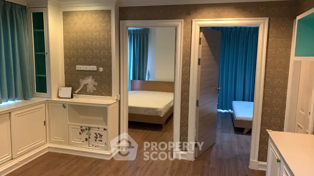 Charming interior with two bedrooms and elegant decor, perfect for modern living.