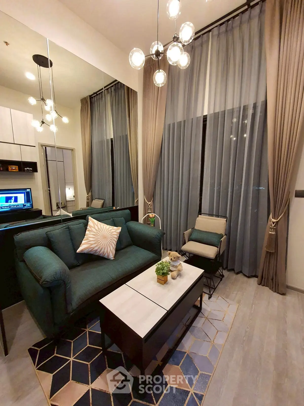 Stylish modern living room with elegant lighting and cozy seating area