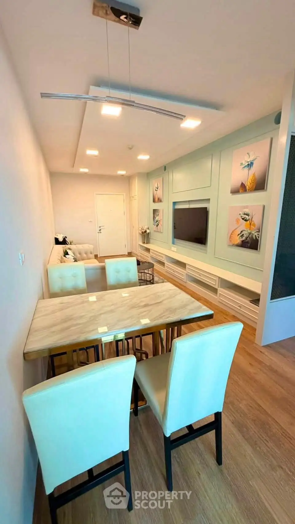 Modern living room with stylish dining area and elegant decor