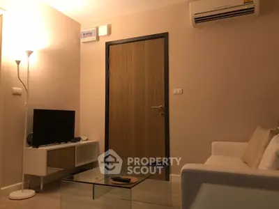 Cozy living room with modern furniture and air conditioning