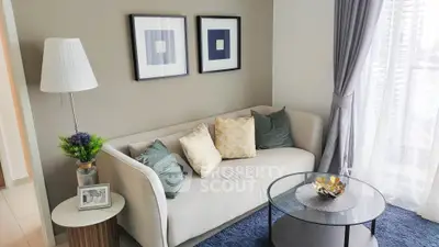 Chic modern living room with cozy sofa and stylish decor