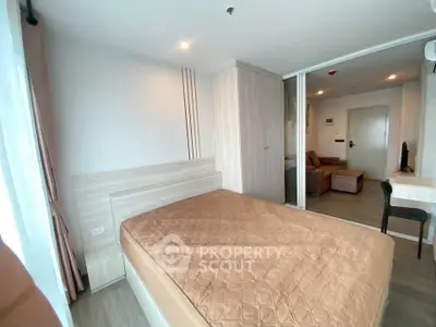 Modern bedroom with cozy bed and stylish decor in a contemporary apartment