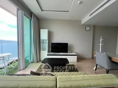 Modern living room with ocean view and stylish furniture