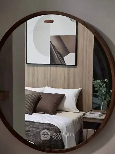 Stylish modern bedroom with cozy bedding and elegant decor