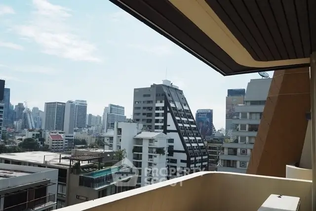 Stunning urban view from a modern balcony overlooking city skyline with unique architecture.