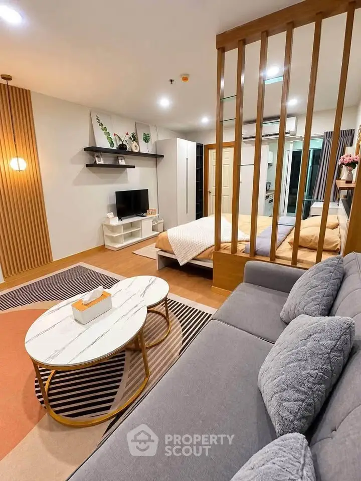 Modern studio apartment with stylish decor and cozy living area