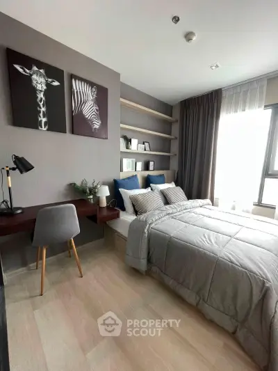 Modern bedroom with stylish decor and cozy workspace