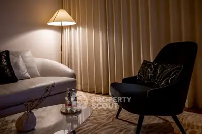 Cozy living room with elegant furniture and warm lighting