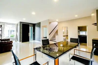 Spacious modern living room with sleek dining area and open layout
