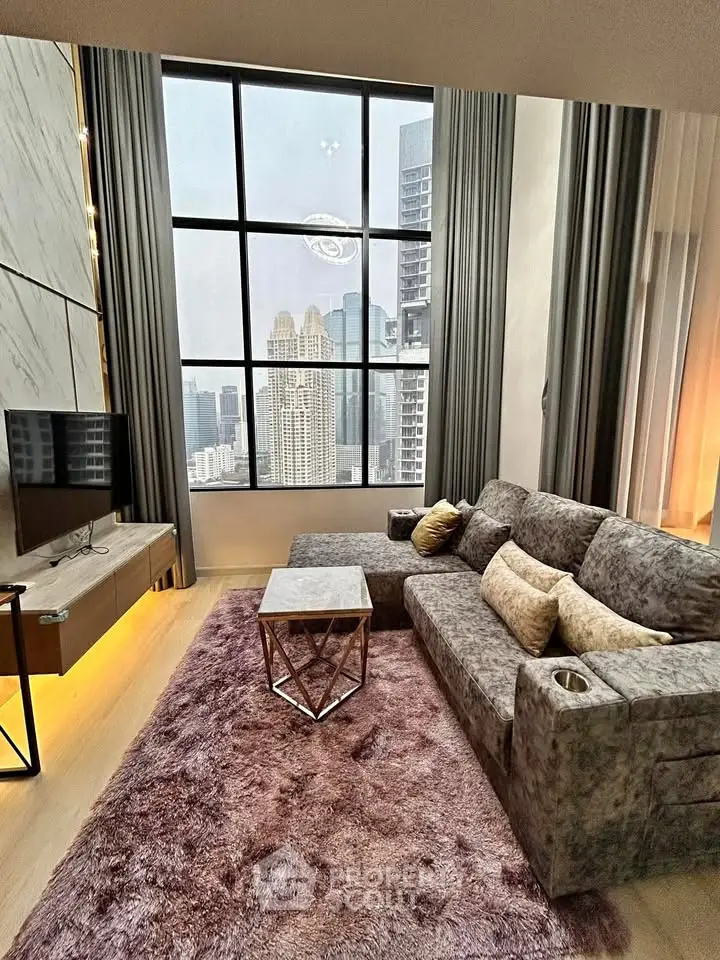 Luxurious living room with stunning city view, plush sofa, and modern decor in high-rise apartment.