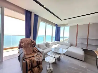 Luxurious living room with stunning ocean view and modern furniture