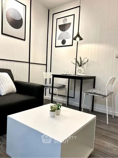 Modern living room with stylish decor and cozy seating area