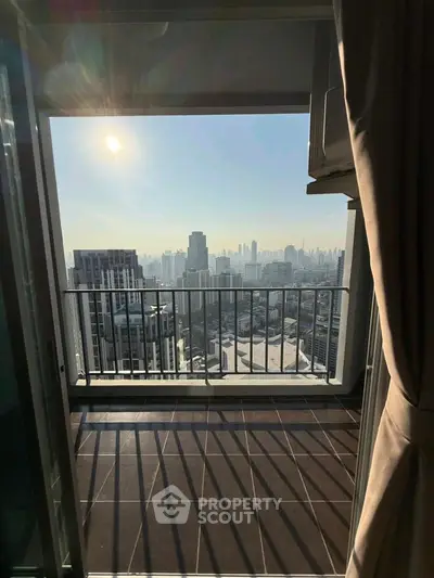 Stunning cityscape view from a high-rise balcony, perfect for urban living enthusiasts.