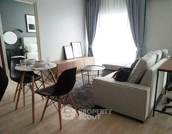 Modern living room with stylish furniture and natural light