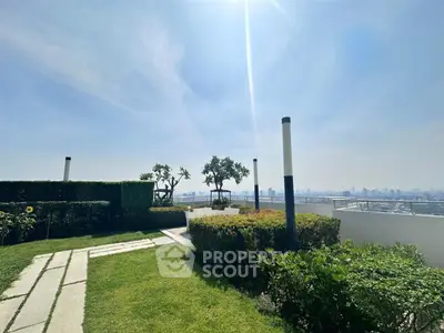 Stunning rooftop garden with panoramic city views and lush greenery, perfect for relaxation and leisure.