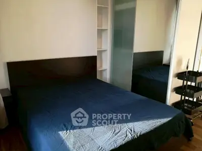 Cozy bedroom with modern design and ample natural light