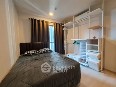 Cozy bedroom with modern storage solutions and natural light
