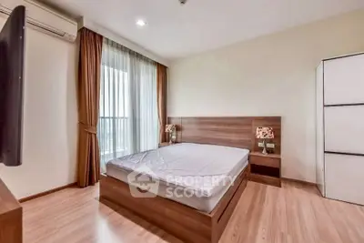 Modern bedroom with wooden flooring, large window, and air conditioning unit.