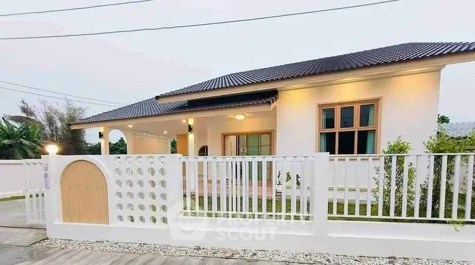 Charming single-story home with modern design and fenced yard, perfect for family living.