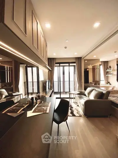 Modern open-plan living room with stylish decor and large windows