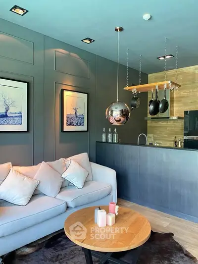 Modern living room with stylish decor and open kitchen layout