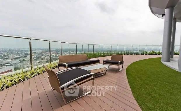 Luxurious rooftop terrace with stunning city views and modern outdoor seating.