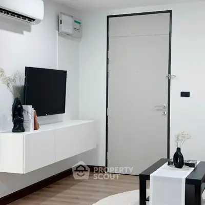 Modern living room with sleek furniture and minimalist decor