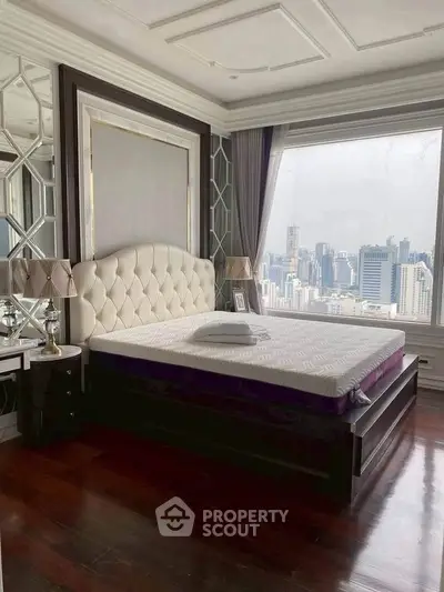 Luxurious bedroom with stunning city view and elegant decor