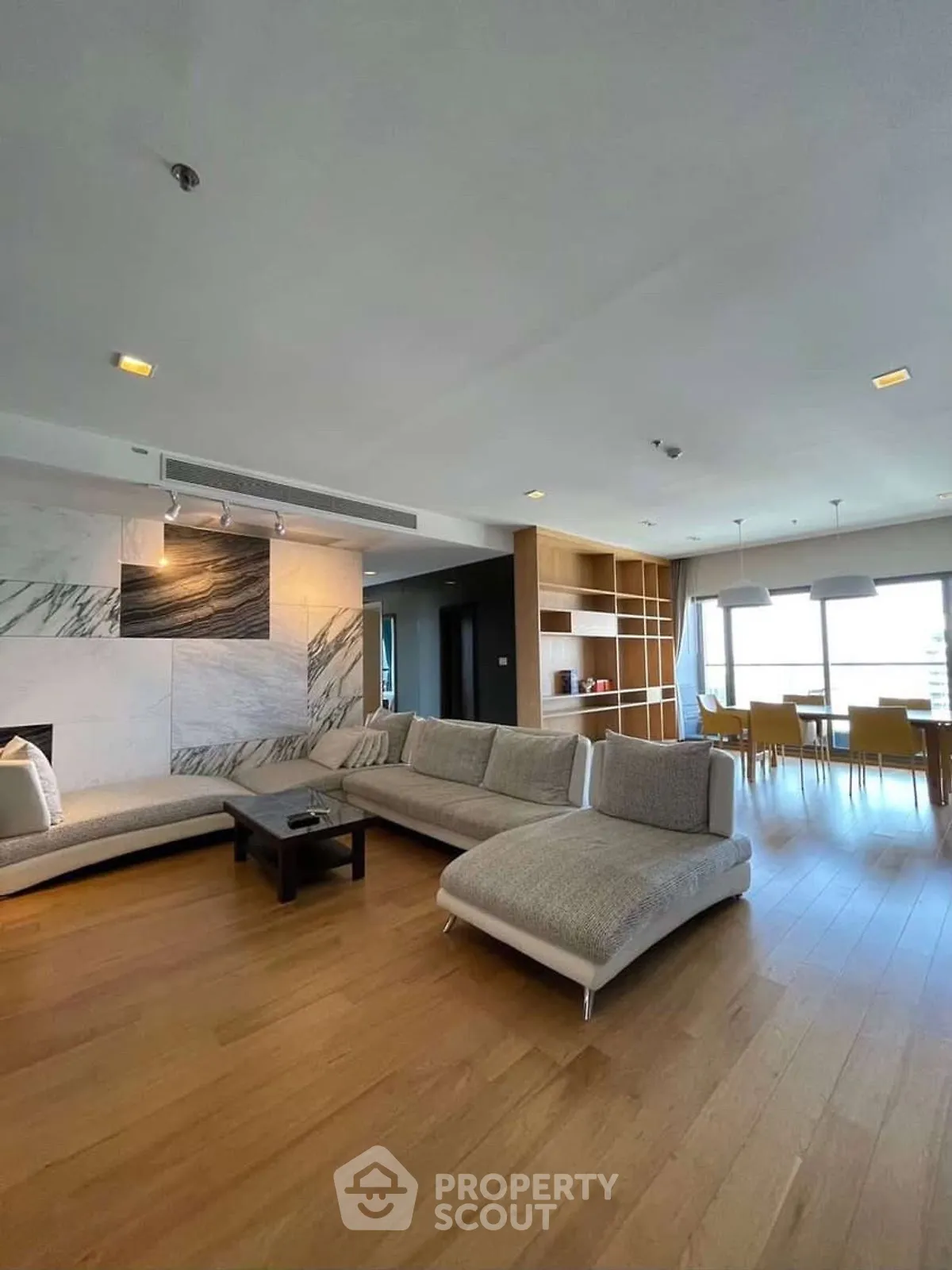 Spacious modern living room with elegant decor and natural light
