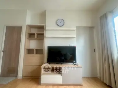 Modern living room with sleek TV unit and minimalist decor