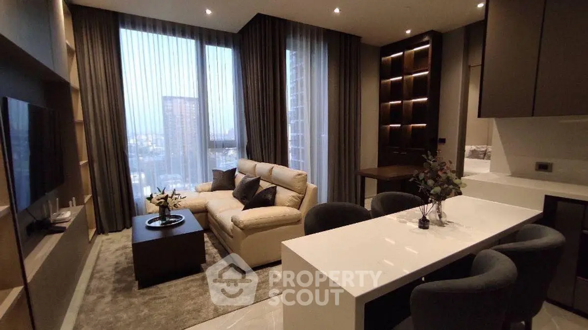 Modern living room with elegant decor and city view, featuring a cozy sofa and stylish dining area.
