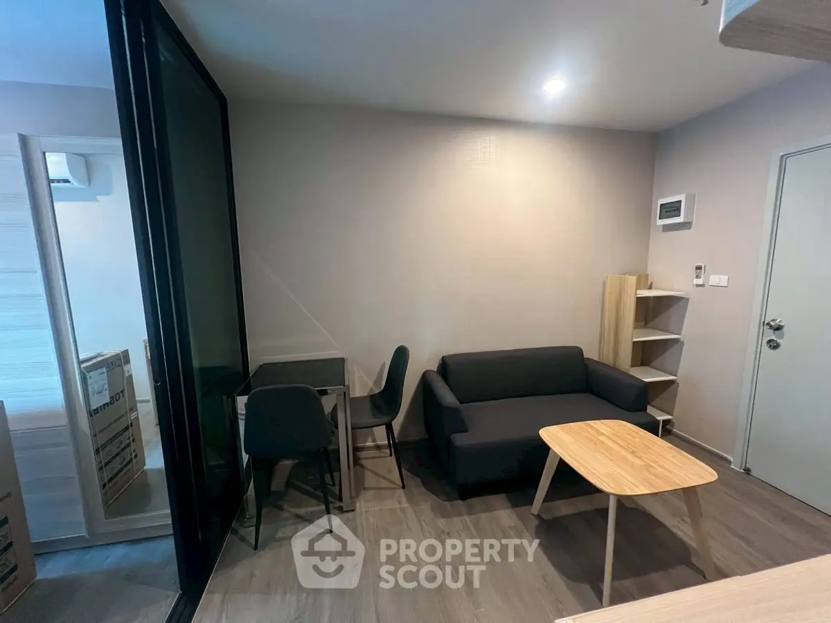 Modern living room with sleek furniture and open layout