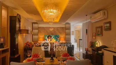 Luxurious living room with elegant chandelier and stylish decor