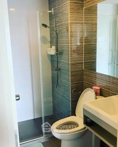 Modern bathroom with sleek shower and stylish sink design